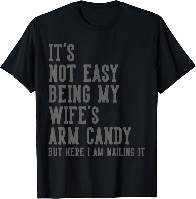 100% Cotton 'S Not Easy Being My Wife'S Arm Candy Husband T-Shirts, Hoodie, Sweatshirt