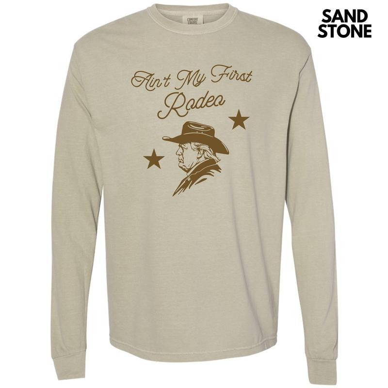 Ain't My First Rodeo Long Sleeve Comfort Colors T-Shirt 'NLB' Hoodie, Sweatshirt | PrintMintTees.com