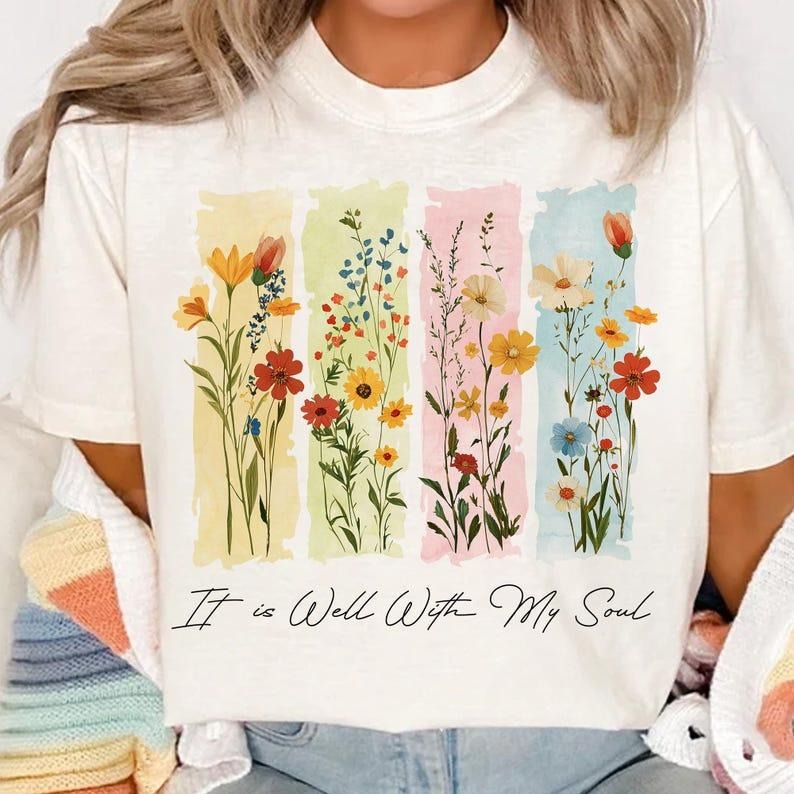 Artistic and Uplifting T - Shirt: Make a Statement with a Floral Motif and Heart - warming Quote