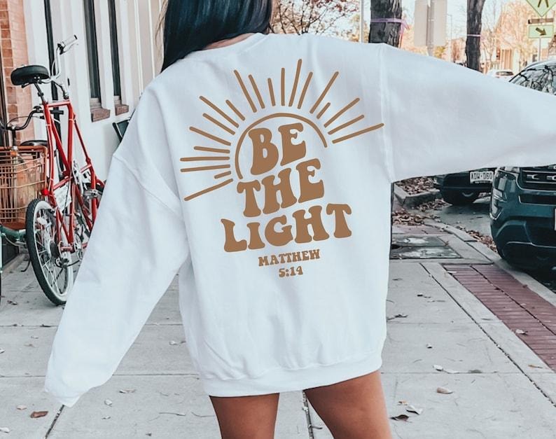 Be The Light , Mathew 5:14, Bible Verse Shirt , Jesus , Religious Shirt , Faith , Believe , Self Love , Pray T43 Hoodie...