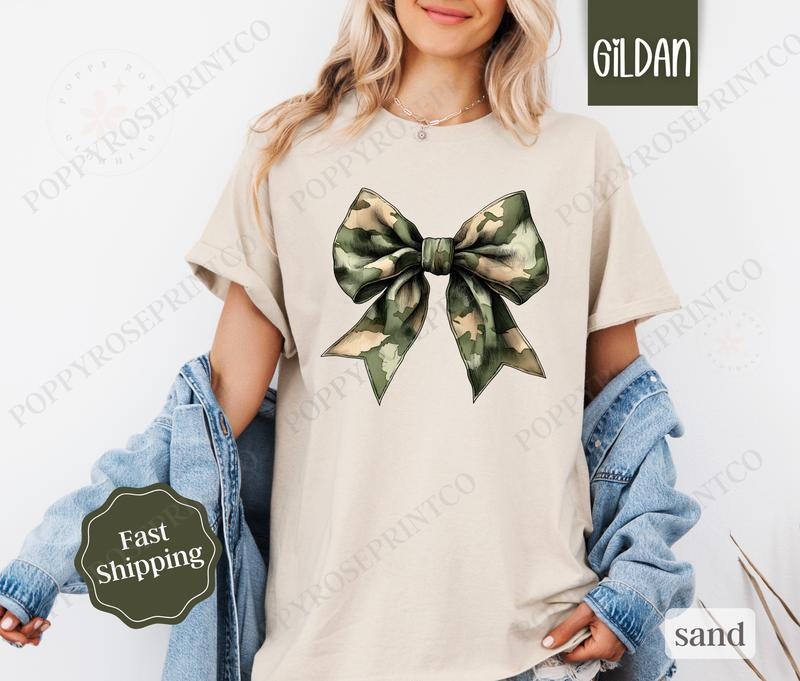 Camo Bow Shirt Gildan, Military Wife Tee, Coquette Bow Women's Tshirt Plus Sizes Hoodie Sweatshirt | PrintMintTees.com