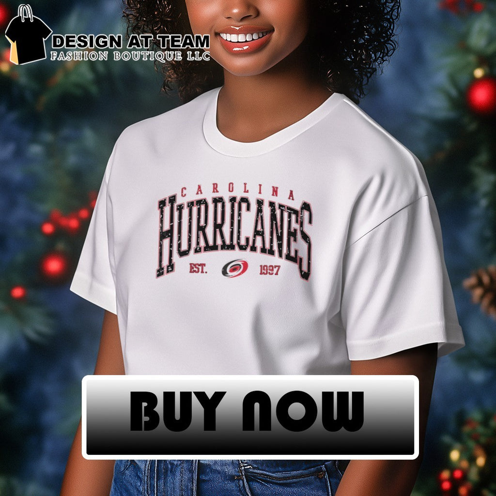 Carolina Hurricanes Ice hockey fan apparel featuring the text est 1997 shirt