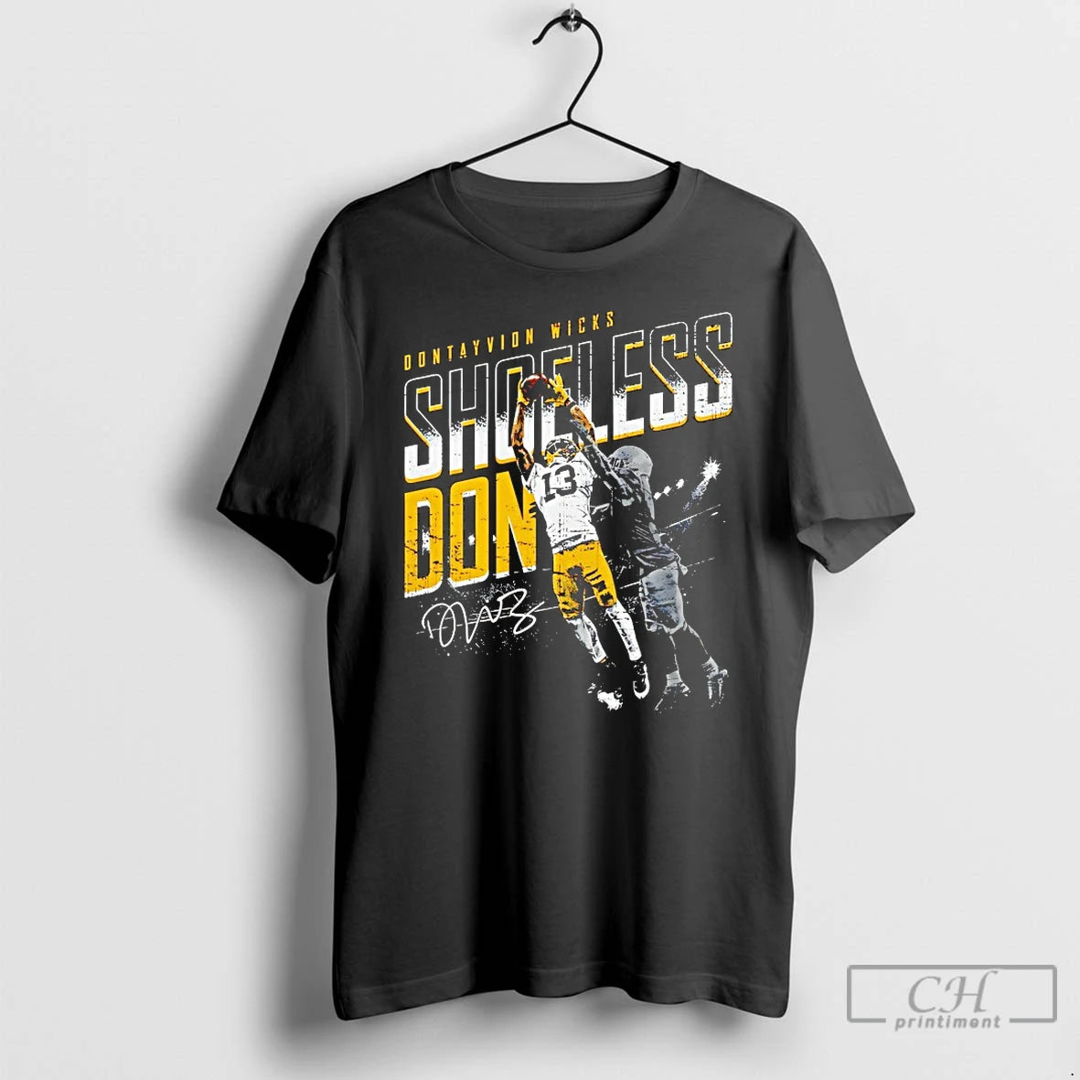 Classic Dontayvion Wicks Green Bay Shoeless Catch T-Shirts, Hoodie, Sweatshirt | PrintMintTees.com
