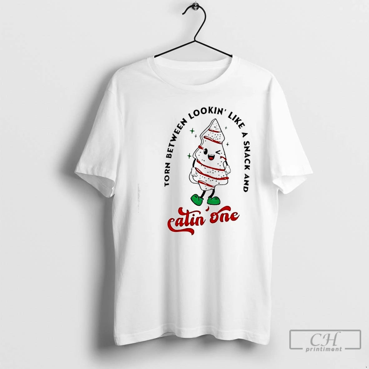 Classic Torn Between Lookin Like A Snack And Eatin One Christmas T-Shirts, Hoodie, Sweatshirt | PrintMintTees.com