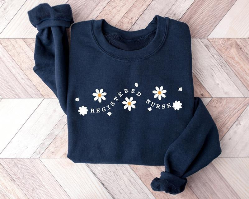 Coquette Daisy Registered Nurse Sweatshirt, Gift For RN Nurse Shirt, Floral Nurse Crewneck Women, Nurse Week Shirt, Nurse...