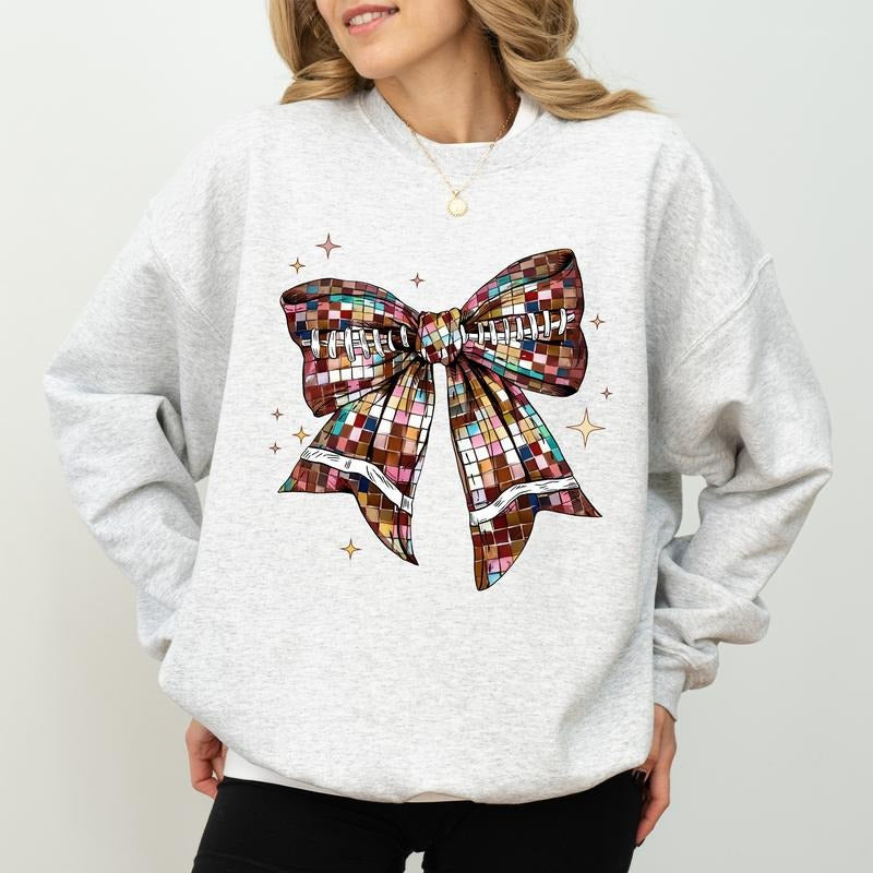 Coquette Football Disco Bow Shirt, Coquette Cheerleading Sweater, Football Season Crewneck, Football Vibes Sweatshirt...