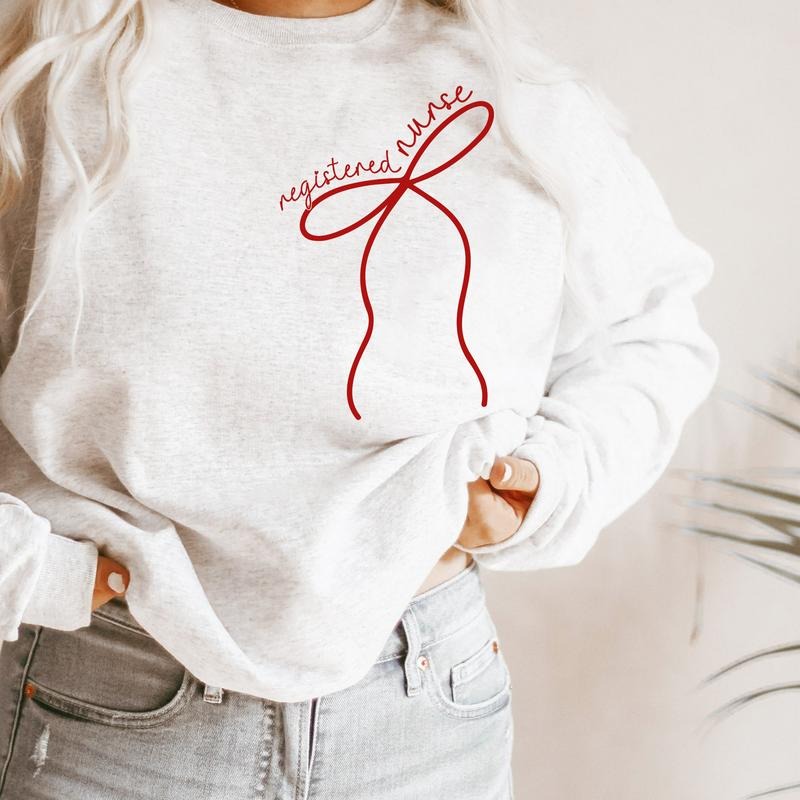 Coquette Registered Nurse Bow Sweatshirt, Gift For RN Nurse Shirt, Nurse Bow Crewneck Women, Nurse Week Shirt, Nurse...