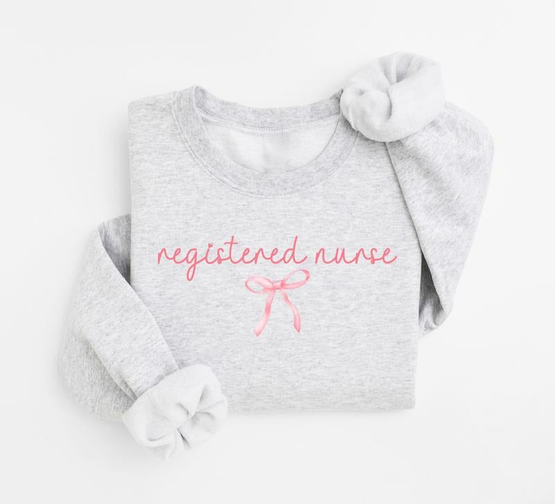 Coquette Registered Nurse Bow Sweatshirt, Gift For RN Nurse Shirt, Nurse Bow Crewneck Women, Nurse Week Shirt, Nurse...