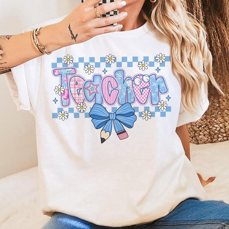 Coquette Teacher Shirt with Preppy Floral Design, Cute Pastel Back to School Tee for Women, Retro Girly Graphic T-Shirt...
