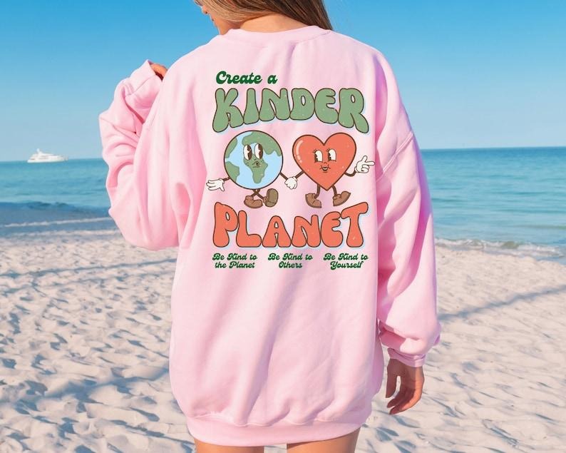 Create a Kinder Planet Hoodie - Oversized Casual T-Shirt with Heart Design and "Be Kind to the Planet" Text, Trendy Y2K...
