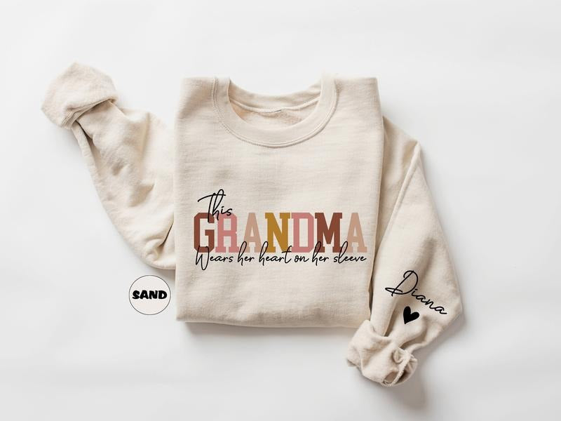 Custom This Grandma Wears Her Heart On Her Sleeve Sweatshirt, Personalized Mimi Hoodie With Grandchilds Names, Nana...