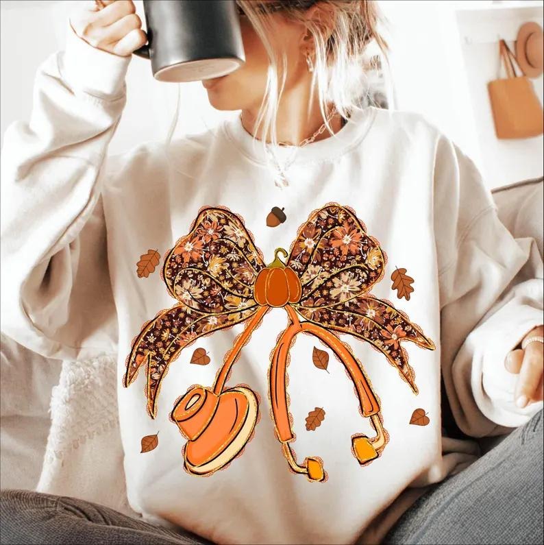 Fall Nurse Sweatshirt, Pumpkin Bow Stethoscope Shirt, Autumn Floral Nurse Top, Cute Halloween Nurse Graphic Tee, Cozy...