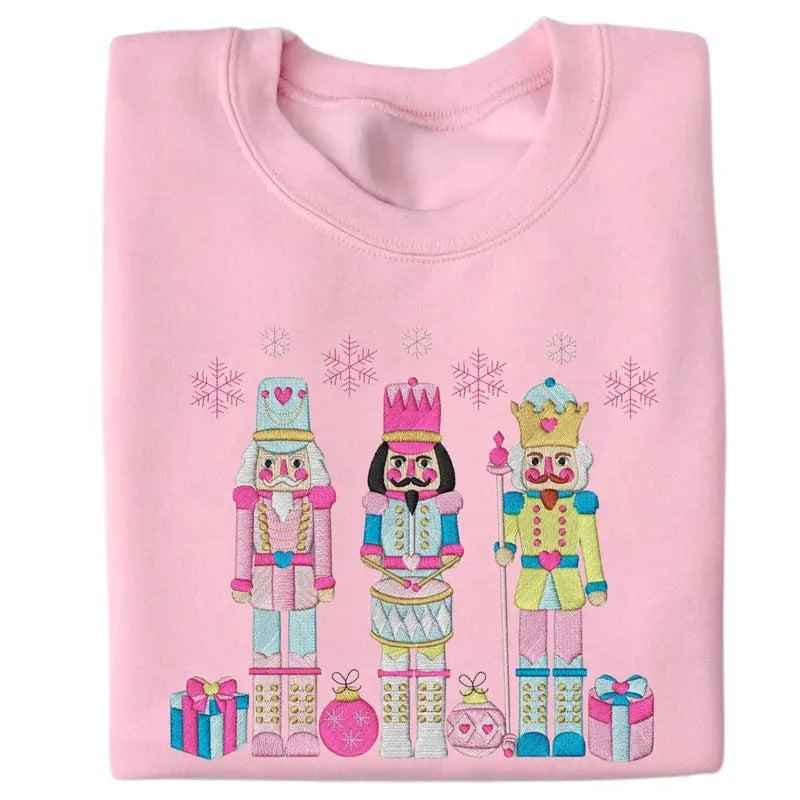 Festive Trio Embroidered Nutcracker Christmas Womenswear Crewneck Pullover Sweatshirt T-Shirts, Hoodie | PrintMintTees.com