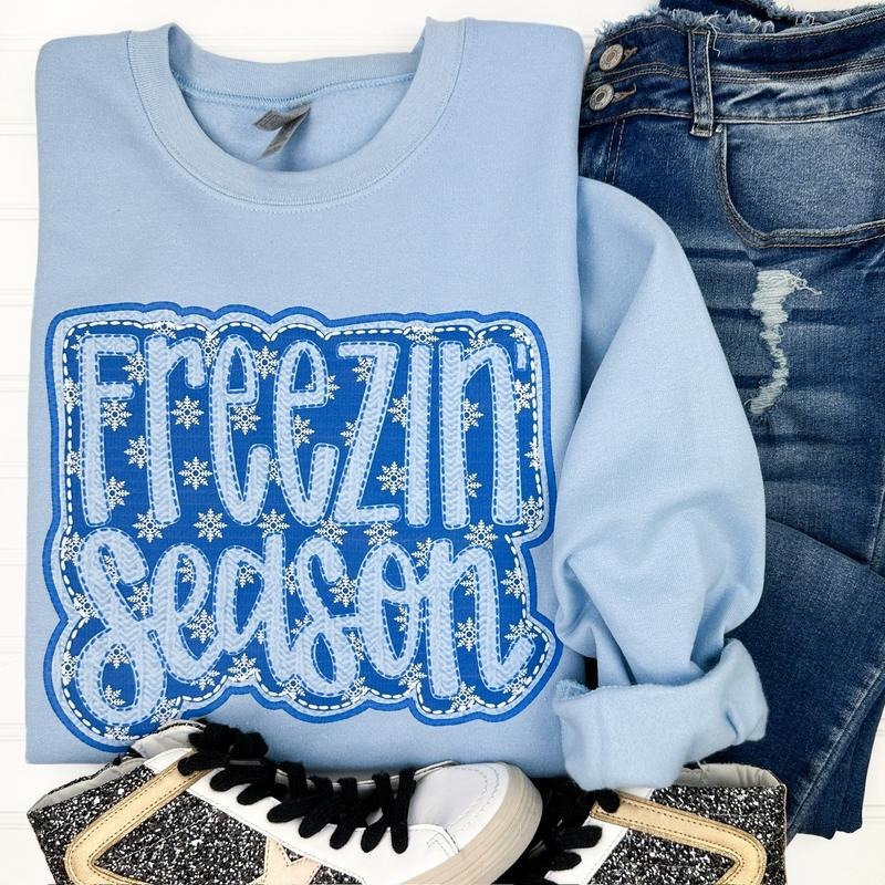 Freezin' Season FAUX Embroidery Gildan Sweatshirt -- Light Blue T-Shirts, Hoodie | PrintMintTees.com