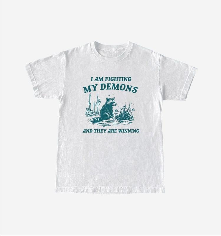 Funny Meme Shirt, I Am Fighting My Demons Tee, Raccoon Gift Unisex T-Shirt Hoodie Sweatshirt | PrintMintTees.com
