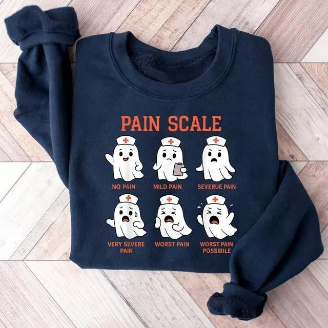 Funny Pain Scale Ghost Nurse Halloween Sweatshirt, Trauma Nurse Triage Shirt, Spooky ER RN Fall Crewneck, Halloween Nurse...