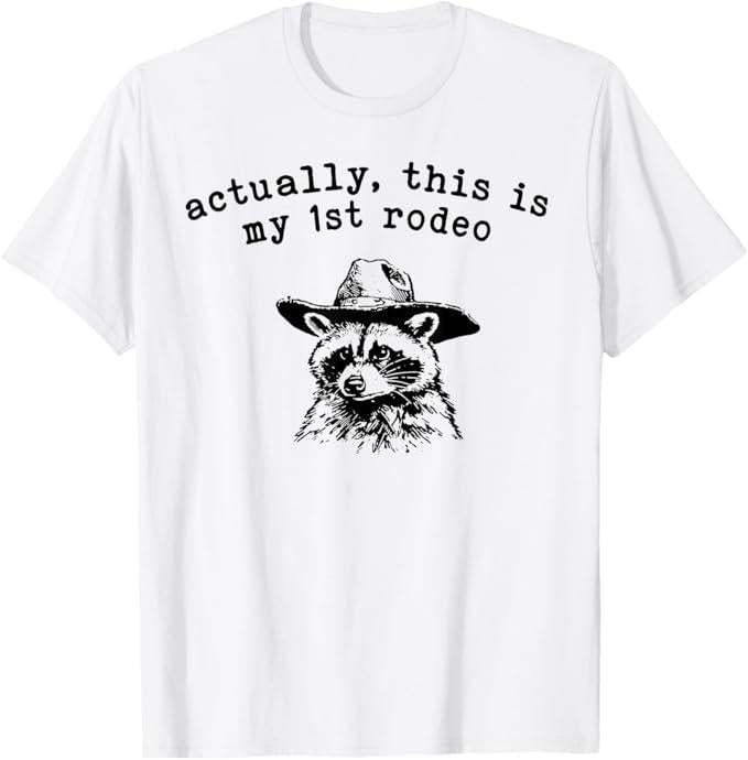 Funny Raccoon Shirt Raccoon Actually This Is My First Rodeo Funny Available Size S 5XL Vintage Raccoon T-Shirts, Hoodie, Sweatshirt