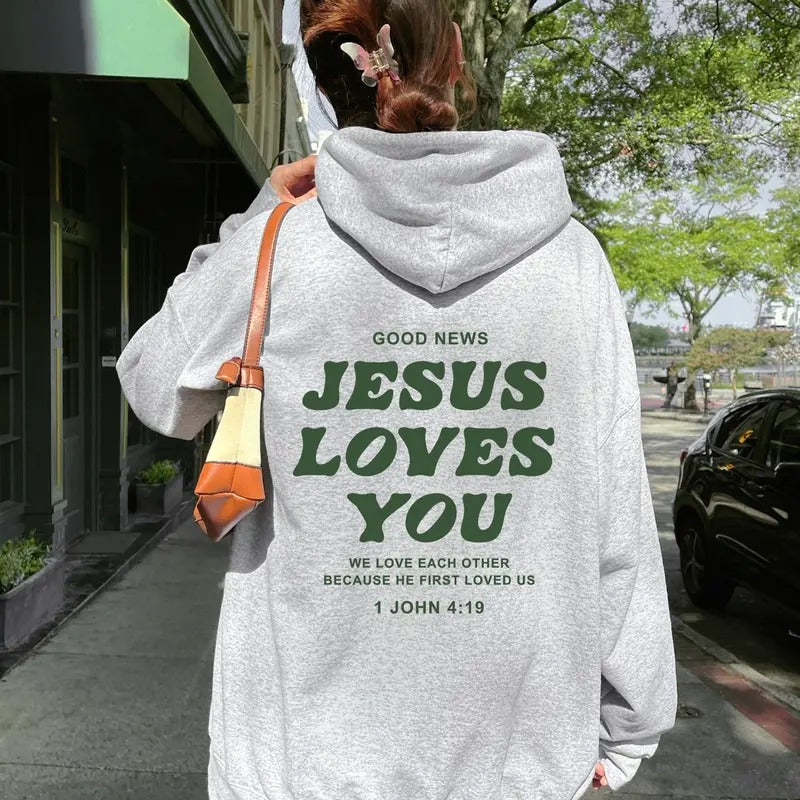 Good News Jesus Loves You Hoodie, Trendy Faith Sweatshirt, 1 John 4 19 Shirt Cotton Tops | PrintMintTees.com
