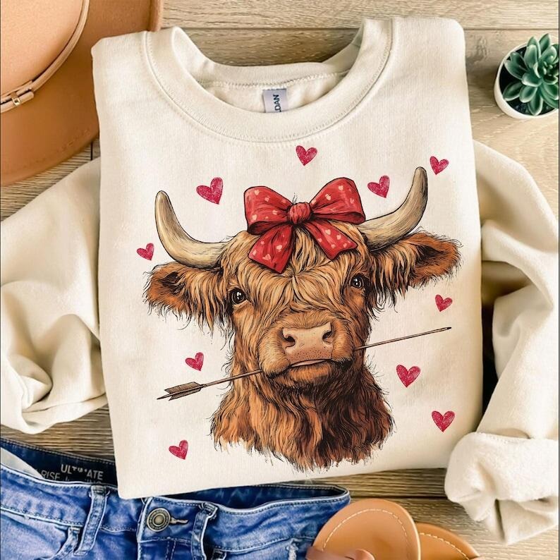 Highland Cow Sweatshirt Valentine's day Coquette,Trending ,Girly Valentine Shirt Hoodie | PrintMintTees.com