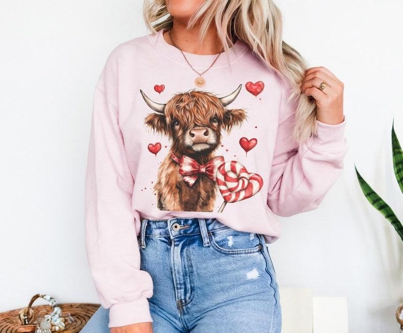 Howdy Coquette Valentine Sweatshirt | Vday Cow Crewneck | Bow Western Design Shirt Hoodie | PrintMintTees.com