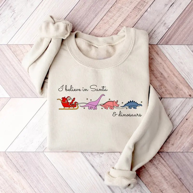 I Believe In Santa And Dinosaurs Sweatshirt, Christmas Santa Sweater, Funny Xmas Shirt, Dinosaur Lover Shirt, Christmas...