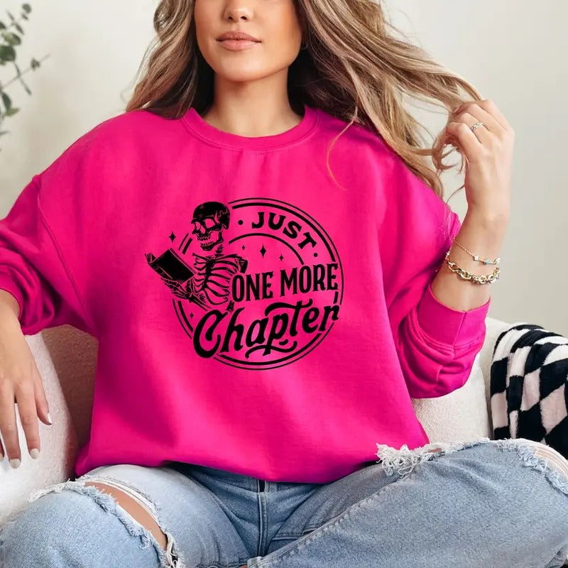 JUST ONE MORE CHAPTER SKELETON READING BOOK Crewneck Sweatshirt T-Shirts, Hoodie | PrintMintTees.com