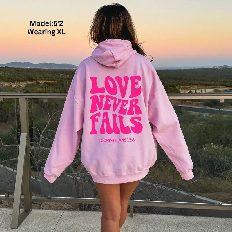 Love Never Fails Hoodie Bible Verse Christian Hoodie Preppy Christian Sweatshirt Cotton Womenswear Shirt | PrintMintTees.com