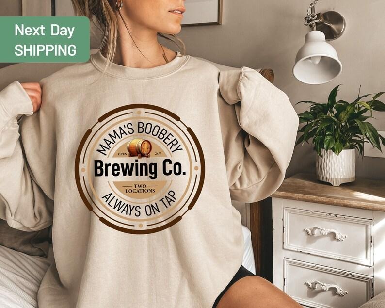 Mama's Boobery Brewing Co , Funny Breast Feeding Crewneck Sweatshirt, Mother Day Mom Gift Shirt Hoodie | PrintMintTees.com