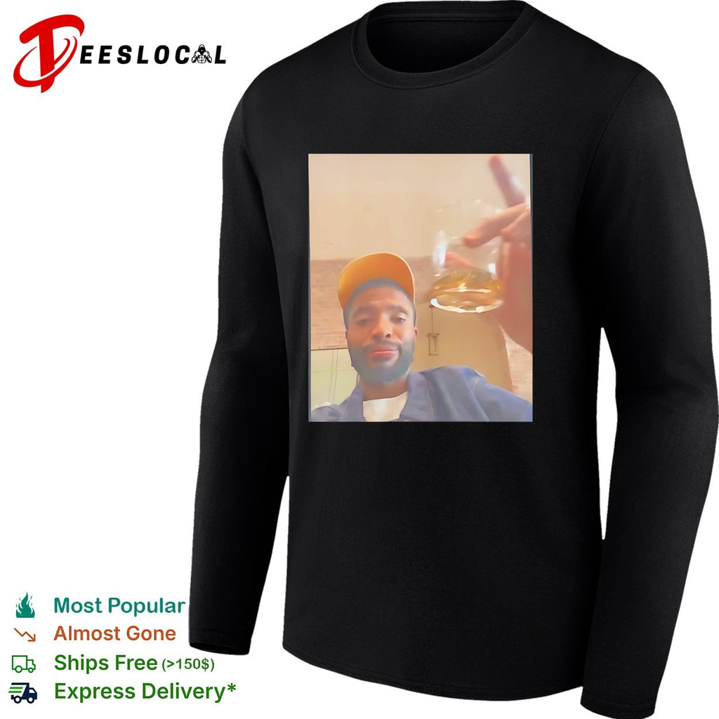 Mikal Bridges Live yellow cap holding a glass of liquor shirt