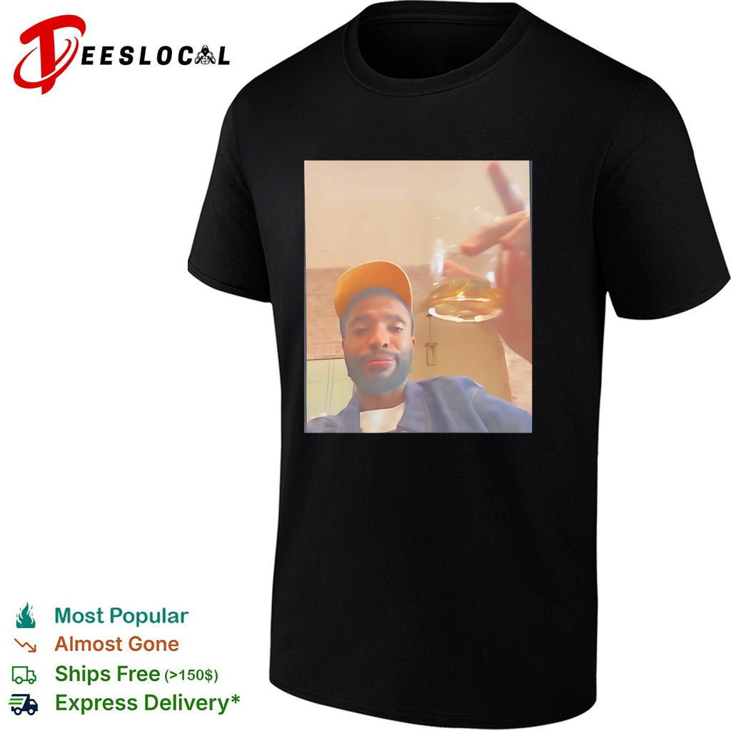 Mikal Bridges Live yellow cap holding a glass of liquor shirt