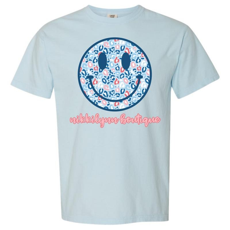 NLB Merch - Blue Patriotic Cheetah Happy Face Comfort Colors T-Shirt Hoodie Sweatshirt | PrintMintTees.com