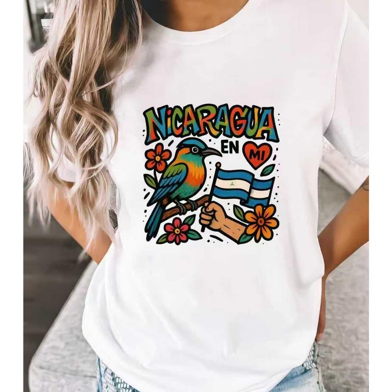 Nicaraguan - Pride Style T - shirt Featuring Colorful Lettering, Bird, Flag and Flowers Hoodie Sweatshirt | PrintMintTees.com