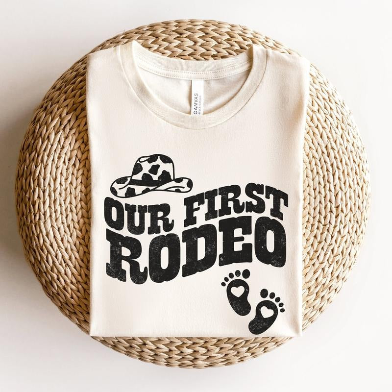 Our first rodeo pregnancy announcement shirt, Western Pregnancy Reveal t-shirt, Country Baby Announcement tshirt, Cowboy...