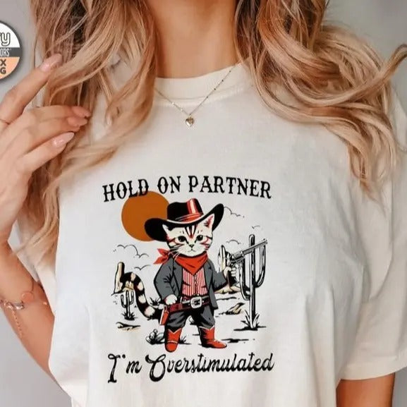 Overstimulated Tshirt, Hold On Partner I'm Overstimulated Shirt, Cowboy Cat Shirt, Cat Meme Shirt Top Womenswear Casual...