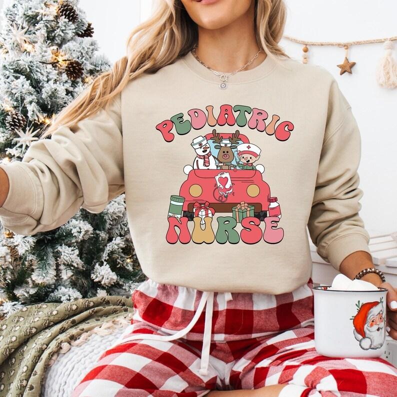 Pediatric Nurse Christmas Sweatshirt, Santa's Favorite Nurse T-shirt, ICU ER Rn Nurse Tee, Christmas Nurse Life Hoodie,...