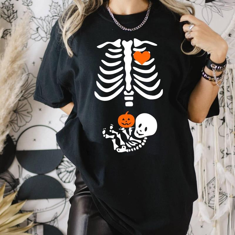 Pregnant Skeleton Shirt, Pumpkin Skeleton Baby Halloween Maternity Shirt, Pregnancy Mom Gift Maternity Shirt With Baby...