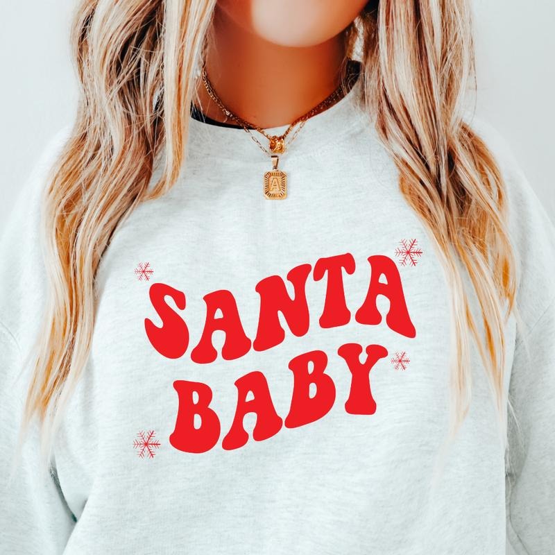 SANTA BABY CREWNECK (Crewneck Sweatshirt, Unisex Fit, Causal Sweatshirt for Christmas, Christmas Holiday Sweatshirt)...