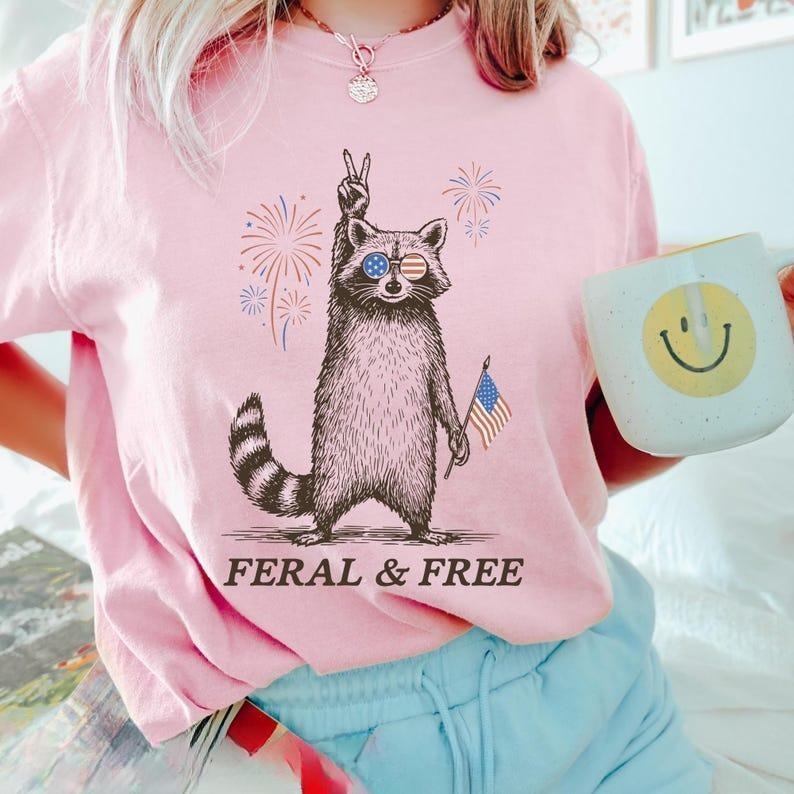 Funny Shirt, Feral & Free Raccoon Shirt, American Feral Shirt Hoodie Sweatshirt | PrintMintTees.com