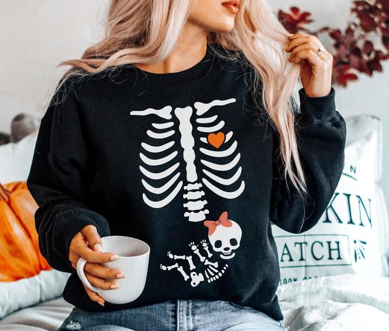 Skeleton Halloween Maternity Sweatshirt, New Baby Girl Pregnancy Announcement Shirt 2024, Pregnant Women Sweater, Mom...