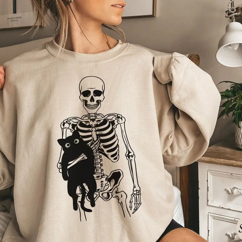 Skeleton and Cat Sweatshirt, Black Cat Halloween Shirt, Spooky Cat Mom Sweater Hoodie | PrintMintTees.com