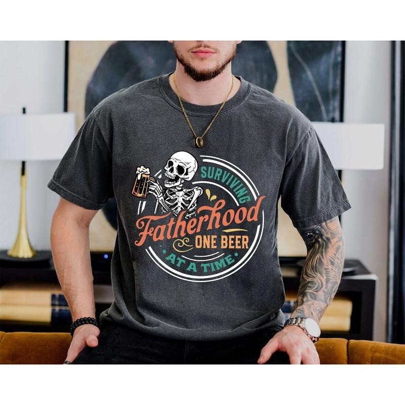 Surviving Fatherhood One Beer At a Time  Shirt, Father's Day Shirt, Funny Dad Shirt Hoodie Sweatshirt | PrintMintTees.com