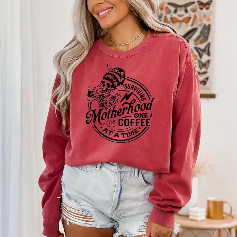 Surviving Motherhood One Coffee at a Time T-Shirt, Funny Mom Life Tee, Skull Graphic Shirt, Mother's Day shirt Hoodie...