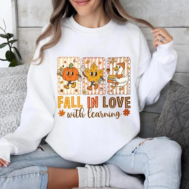 Fall In Love With Learning Sweatshirt/T-Shirt, Trick Or Teach Pumpkin Teacher Shirt, Cute Halloween Classroom Outfit,...