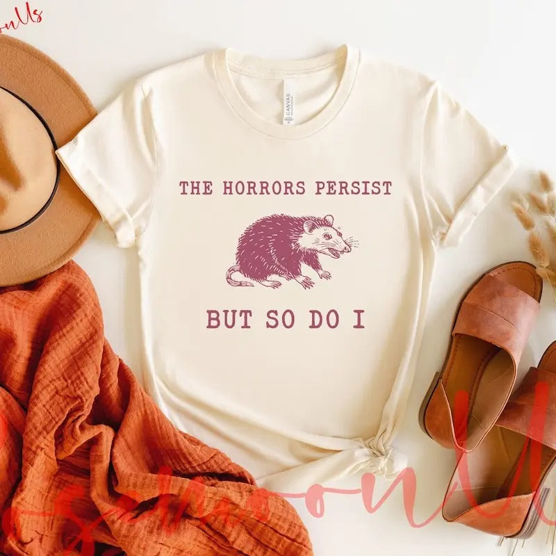 The Horrors Persist But So Do I, Sarcastic Shirt, Funny Mental Health, Meme Shirt, Raccoon Gift Hoodie Sweatshirt
