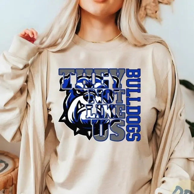 They Not Like Us Blue Bulldogs Tshirt, School Spirit Shirt Sublimation, College Cheer Team Shirt. Top Womenswear Hoodie...