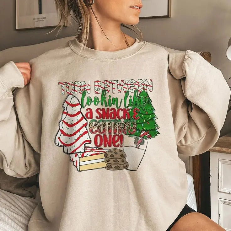 Torn Between Lookin Like a Snack and Eatin One Sweatshirt, Christmas Sweatshirt For Women, Christmas Tree Cake Lover...