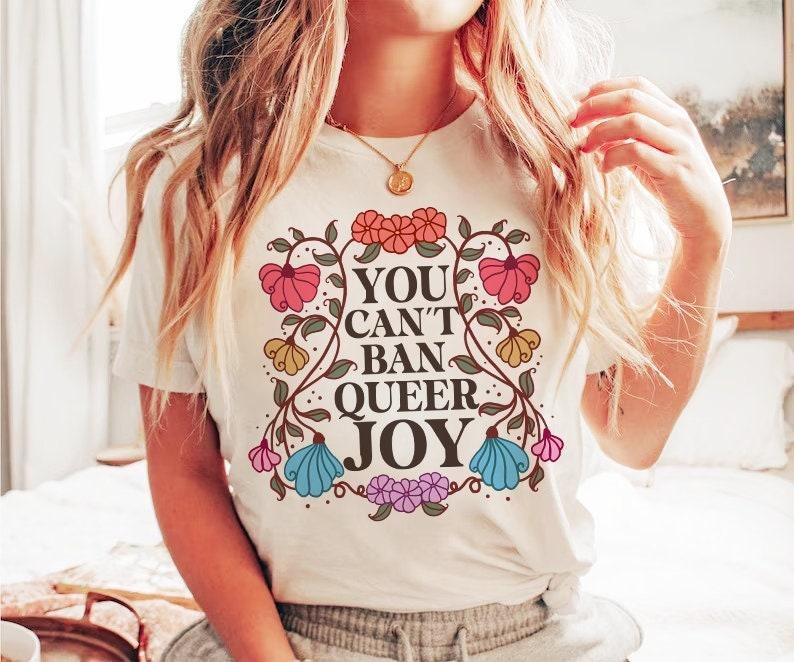 You can't ban queer joy shirt | queer joy shirt | trans joy shirt | retro floral lgbtq | lgbtq wildflower | queer |...