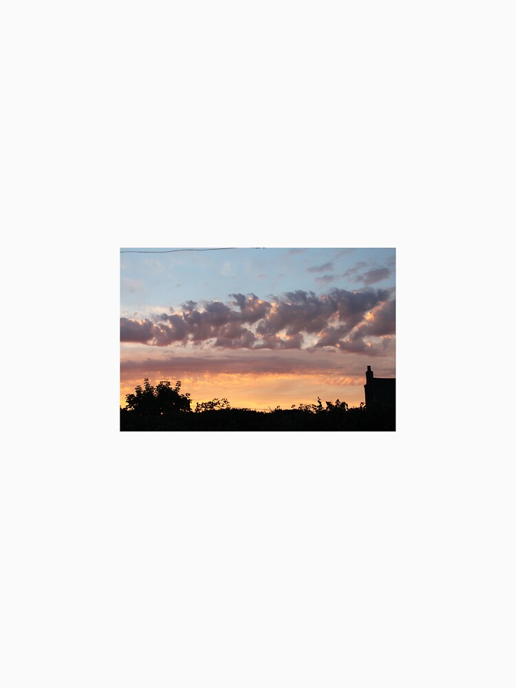 Devon sunset with house silhoutted against clouds by Emma  Amies