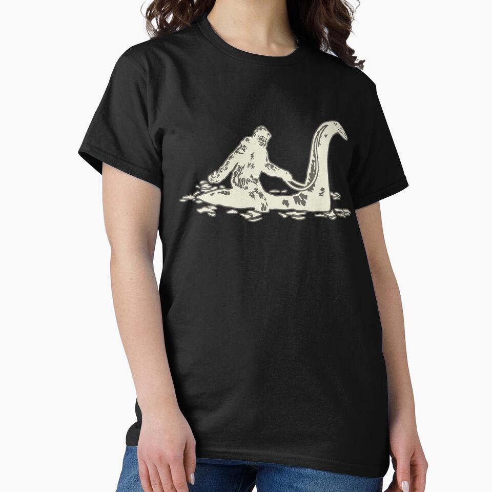 Bigfoot Sasquatch Riding The Loch Ness Monster Funny Short Sleeve T-Shirt by ChockletBoy