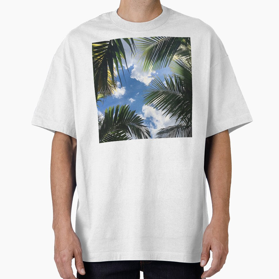 tropical view of blue sky and palm trees by dcrc